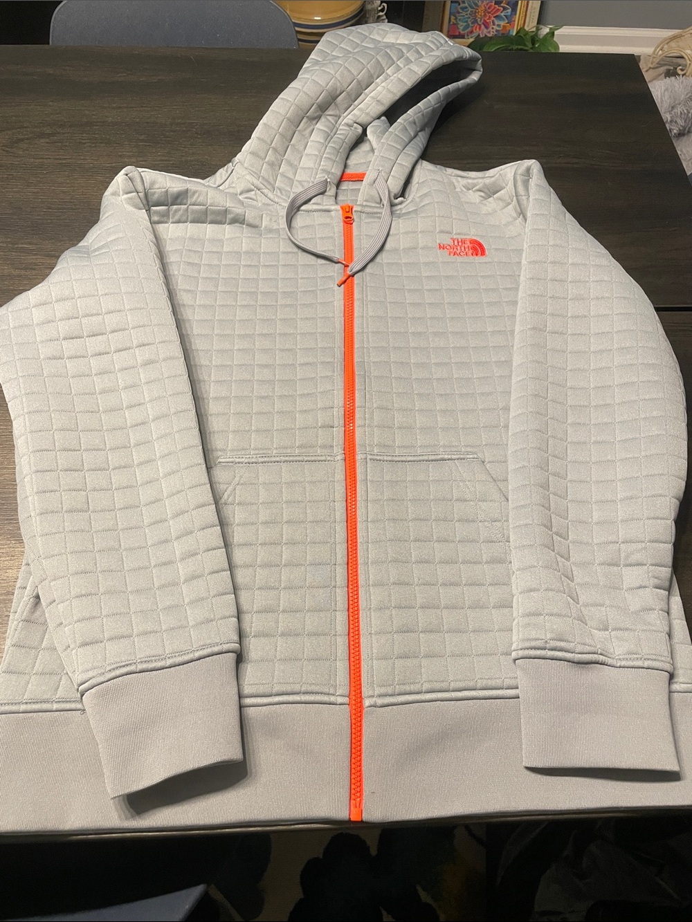 The North Face Light Gray Quilted Hoodie with Orange Zip